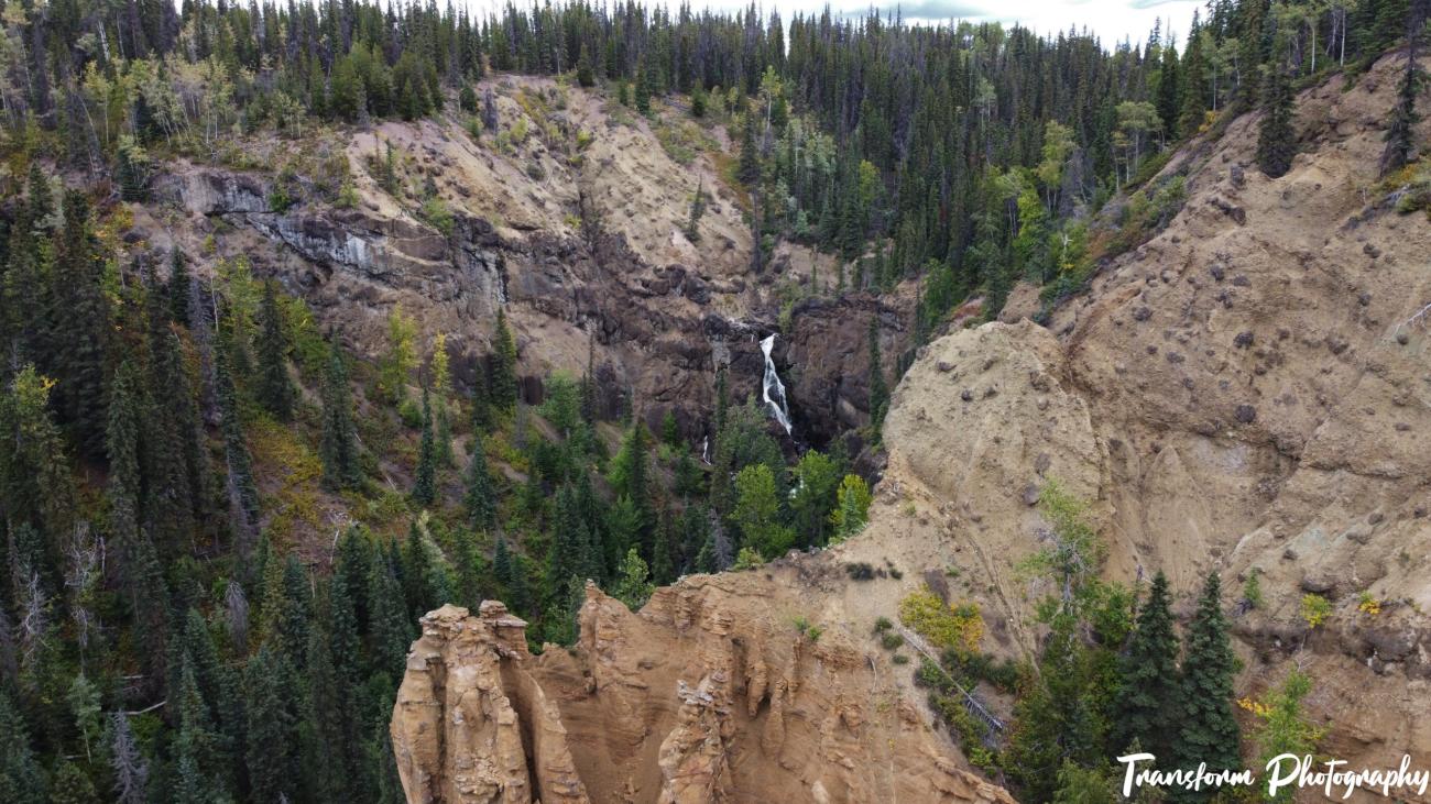 Panoramic view of Nourse Creek Falls craggy hills.