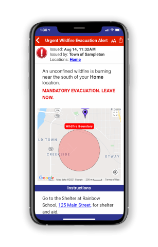 Smartphone displaying a wildfire evacuation alert map.